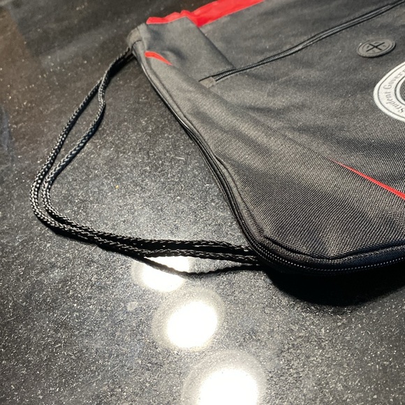 Expandable, sling, backpack, heavy duty area for your headphones to come through - Picture 2 of 7